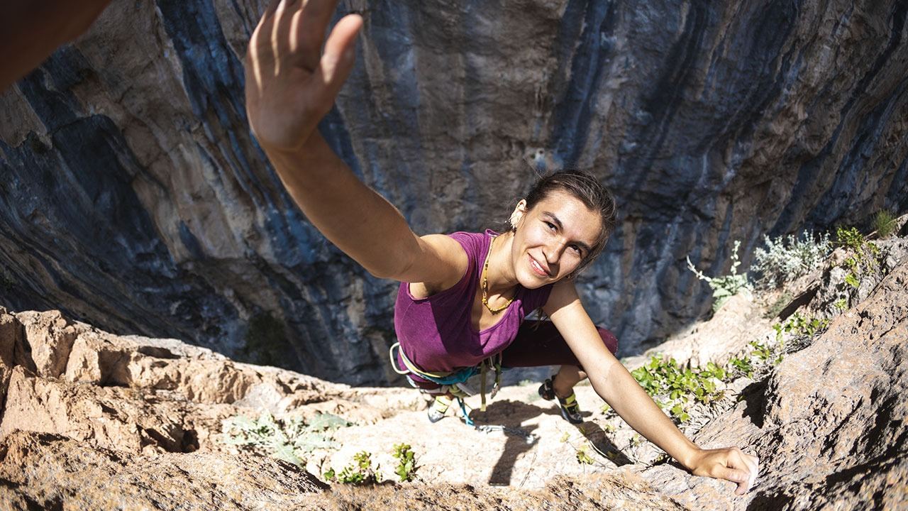 Climber on a rock face using Safe Point rope access equipment